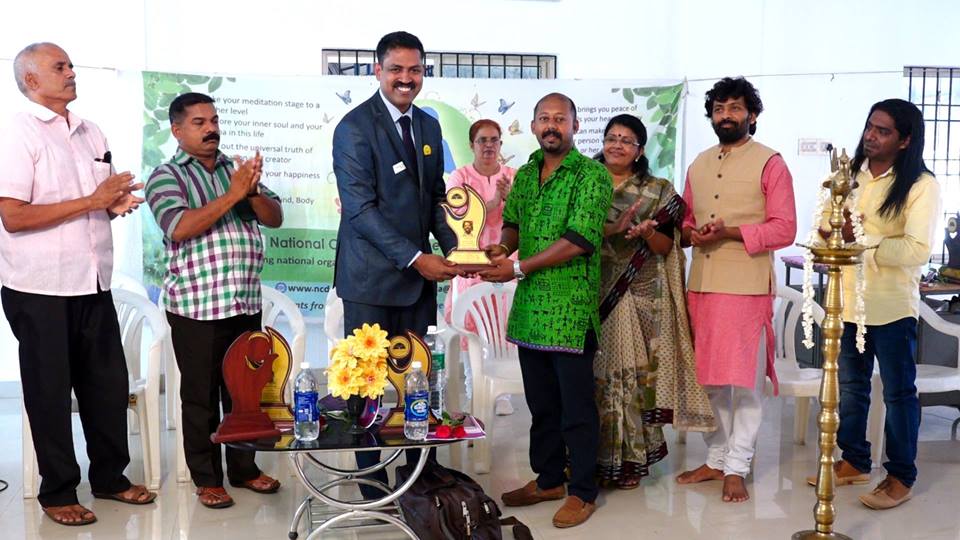 Presenting Social Activist Award to Prasanth Pangan